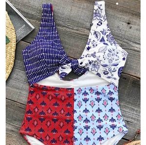 Fun one piece cut out multi pattern swimsuit